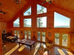 The ceiling to floor windows at The View is perfect for enjoying the mountains in any kind of weather.